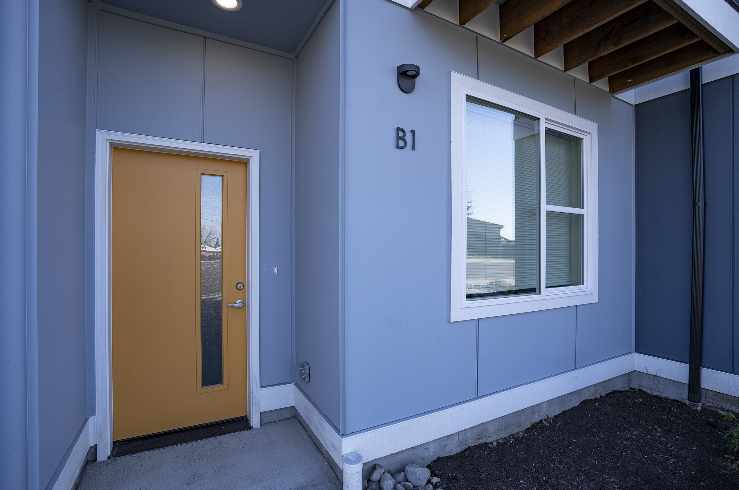 Private covered entry at One-12 Townhomes Lakewood WA